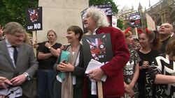 Dozens of fox hunting protesters including Brian May and SNP group leader Angus Robertson hold rally at Westminster as Cameron is forced into climbdown on English hunt ban by Scots nationalists News Clip