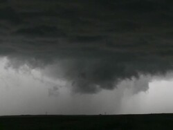 WS View of dark menacing clouds and rain over prairie landscape / North Dakota, United States Stock Footage