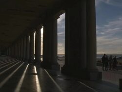 MS People walking infront of Colonnades of Palace of Thermes at Waterfront / Ostend, Flanders, Belgium Stock Footage