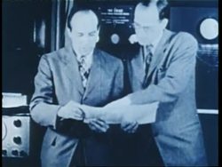 People work with a large ENIAC computer. News Clip