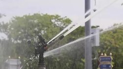 Water sprinkler showering grass.  Part 2 Stock Footage