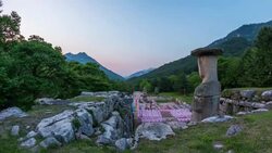 Day and night view of standing stone statue and five-story stone pagoda(Korea treasure) in Mireukdaewonji(Korea historic place) Stock Footage