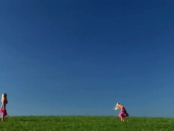 HD: Two Little Girls Playing Badminton Stock Footage