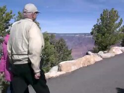 Grand Canyon couple of tourists Stock Footage
