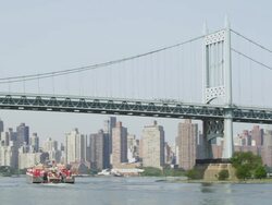 WS View of boat moving from under Barge & Manhattan Bridge / New York, United States Stock Footage