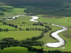 Aerial wide shot pan river in Galway / Ireland Stock Footage