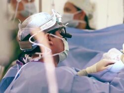 Doctors performing a surgery Stock Footage