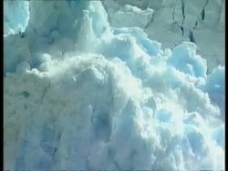 CU Zooming to MS, Ice from glacier collapsing into sea, Arctic circle Stock Footage