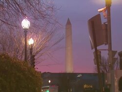 Washington Monument from street, Washington DC, USA, evening Stock Footage