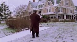 Exterior country inn with people in foreground, 1908 - reenactment, clip 2 Stock Footage