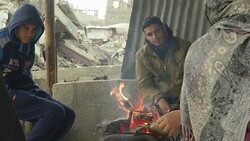Homeless Palestinians seek shelter from freezing weather any way they can News Clip