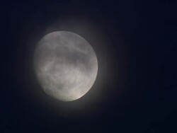 CU Shot of Moon in clouds / Marid, Spain Stock Footage