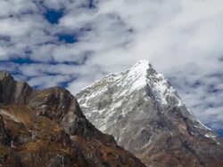 Time-lapse of rocky Himalayan peaks and passing clouds. Cropped. Stock Footage