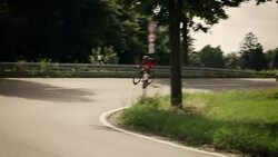 Man riding racing bike Stock Footage