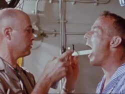 May 24, 1962 astronaut Scott Carpenter getting medical exam after splashdown of Mercury 7 capsule Stock Footage