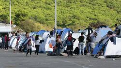 Syrian migrants fleeing the war and escaping to Europe,  who have landed on the Greek island of Lesvos on the north coast at Efthalou. Up to 4,000 migrants a day are landing on the island and overwhelming the authorities. They are traficked by illegal Turk Stock Footage