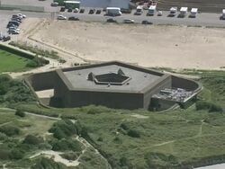MS AERIAL DS PAN View of Napoleonic Fort at Ostend beach / Flanders, Belgium Stock Footage