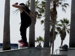 WS SLO MO Shot of guy doing tail spin on top of platform / Venice, California, United States Stock Footage
