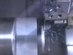 CU computer controlled spindle bore lathe machine grinding a metal work piece / Redlands, California,USA Stock Footage