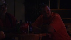 People playing pool and watching presidential debate News Clip