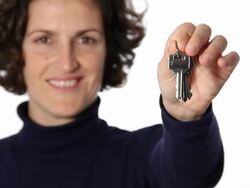 Woman showing keys Stock Footage
