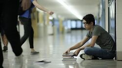 Young adult males bullying another student Stock Footage