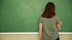 Young student writing math formula Stock Footage