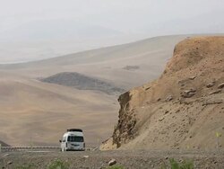 WS View of cars running on road / South Of Peru, Nazca, Peru Stock Footage