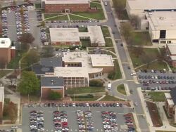 MS AERIAL Shot A&T University and car in parking lot / North Carolina, United States Stock Footage