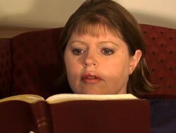 Woman reading Bible Stock Footage