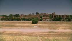 A field with a dirt path in the Circus Maximus in Rome, Italy. Stock Footage