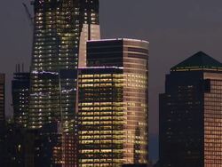 A cluster of Skyscrapers in downtown at twilight in New York City Stock Footage