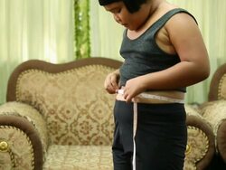 girl with measuring tape Stock Footage