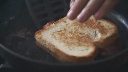Preaparing and Roasting Bacon Sandwich Stock Footage