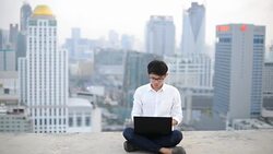Young business man using laptop Online shopping with smart phone Stock Footage