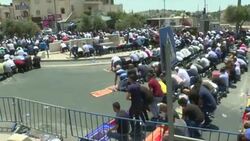 CLEAN : Palestinians pray outside Jerusalem holy site News Clip
