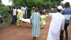 Ebola Burial Team Take Bodies from Houses News Clip