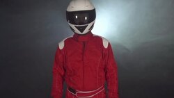 Motor Biker / Formula One Driver folding arms Looking at camera Stock Footage