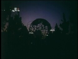 1964 point of view on tree-lined promenade toward Unisphere at dusk / NY World's Fair Stock Footage