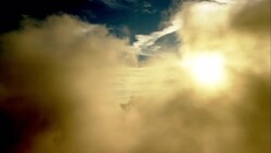Sun rays beam through cirrus clouds during a hurricane. Stock Footage
