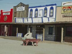 MS TS Passing on Route 66 driving through petrol pump / Seligman, Arizona, USA  Stock Footage