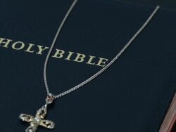 HD Tracking Shot: Holy Bible with Cross (4:2:2@100 Mb/s) Stock Footage