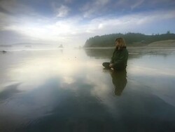 WS POV ZO Woman meditating on beach / Bandon, Oregon, United States Stock Footage