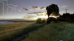 Static shot of a train travelling through the countryside Stock Footage