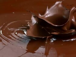 HD Super Slow-Mo: Strawberries Splashing Into Chocolate Stock Footage