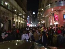 Medium Shot - Crowded Bourbon Street at night / New Orleans Louisiana Stock Footage