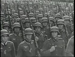 Adolf Hitler talks to a Nazi officer during World War II. News Clip