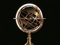 An armillary sphere slowly rotates. Stock Footage