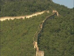WA overgrown and decaying section of Great Wall of China, Mutianyu, China Stock Footage