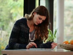 Beautiful woman digital tablet in a modern home. Stock Footage